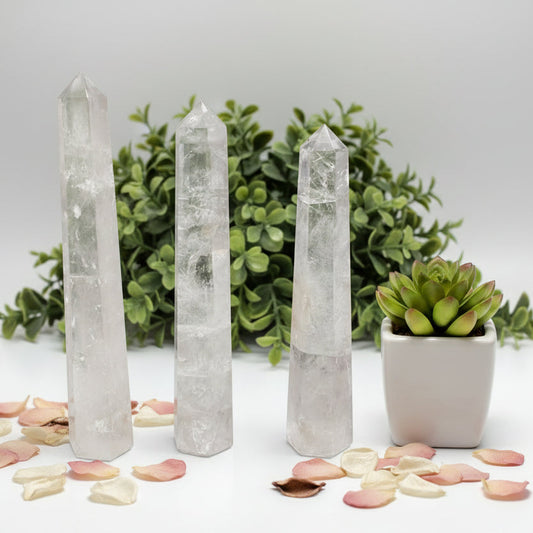 Three crystal towers on a white background